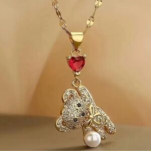 Gold Teddy Bear Pendant Necklace with Red Heart.